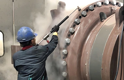 Limpieza a vapor de grandes contenedores industriales